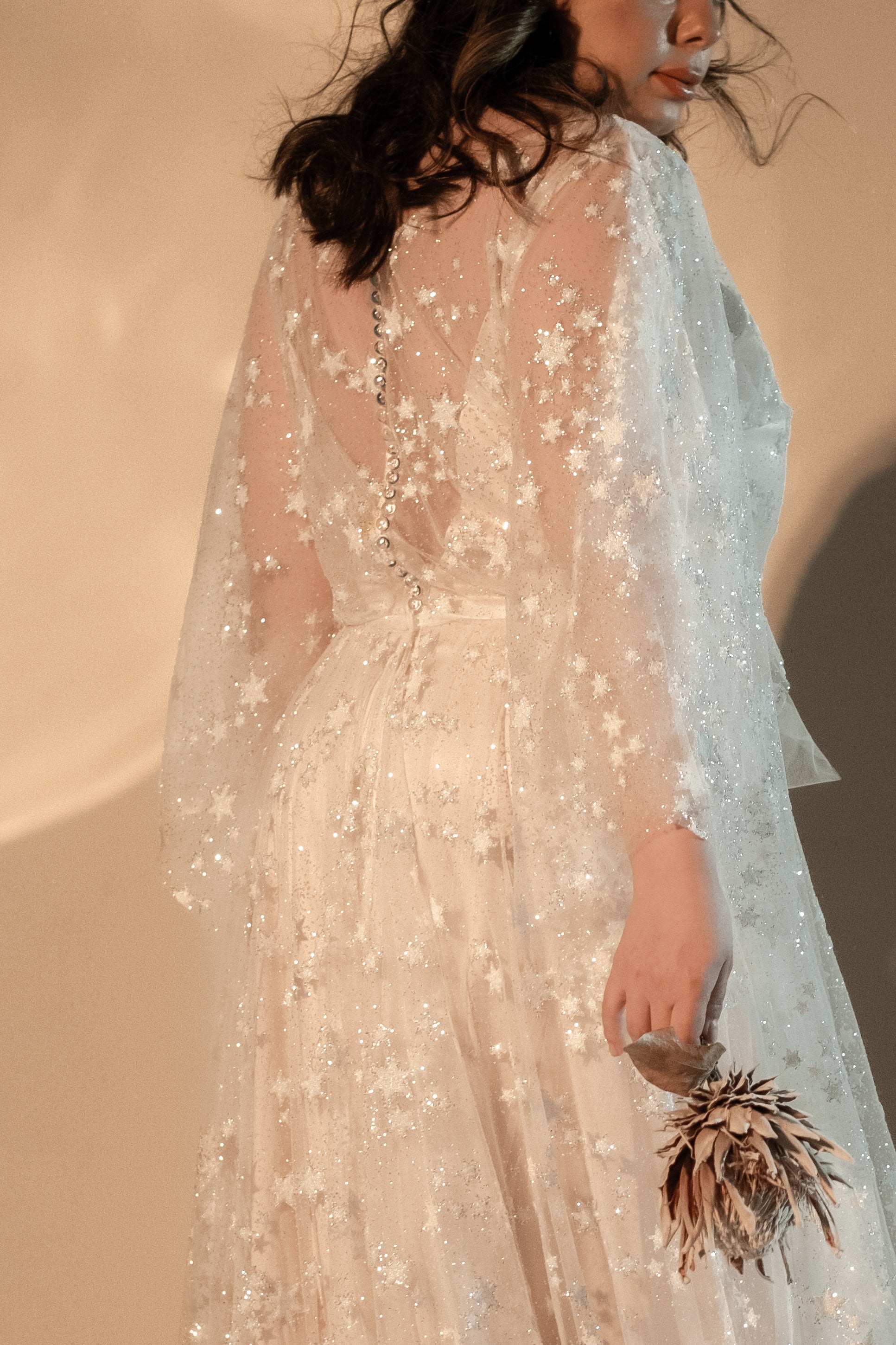 vory celestial wedding dress with reflective stars and soft train