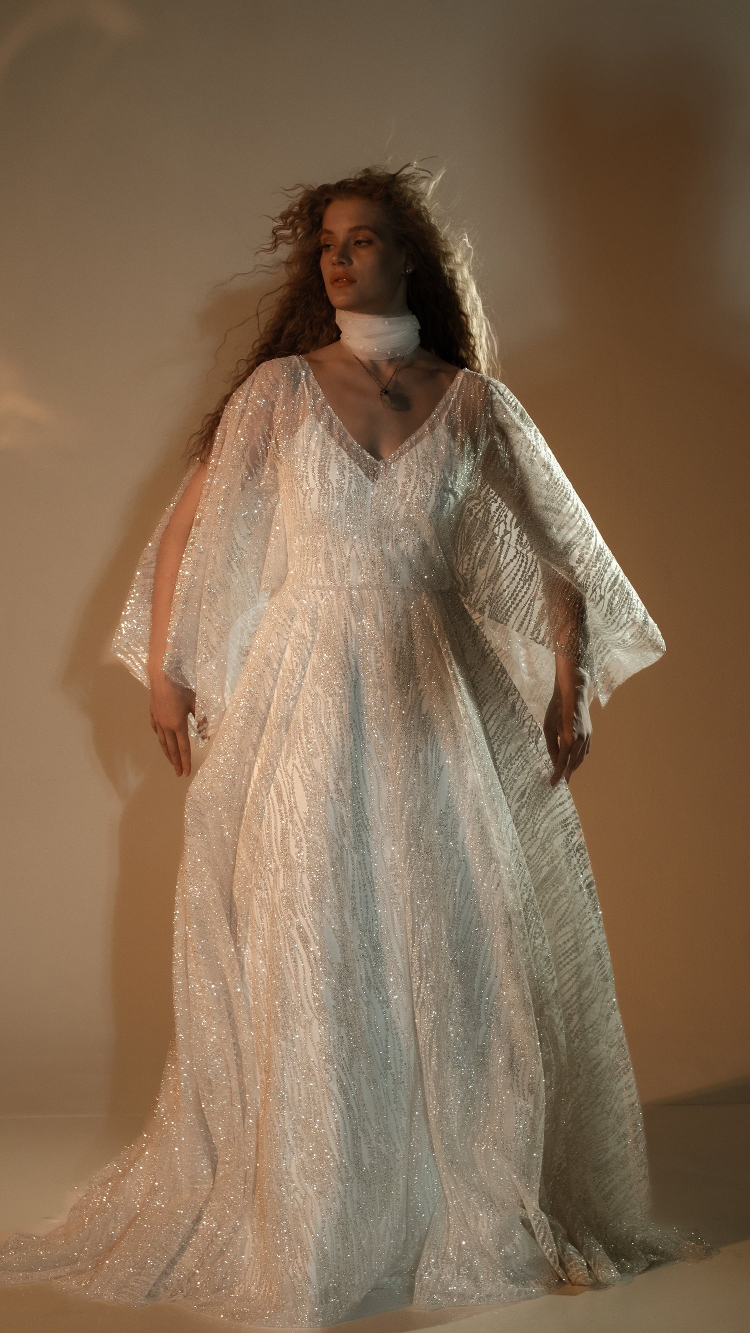 Modern boho wedding look with shimmer lace gown in ivory