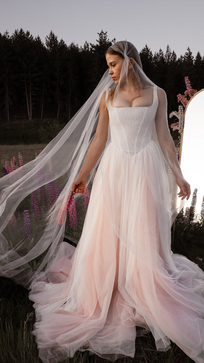 3-in-1 fluid super organza veil worn as a mantilla-style veil, neck scarf and editorial bridal veil with ultra-light finish