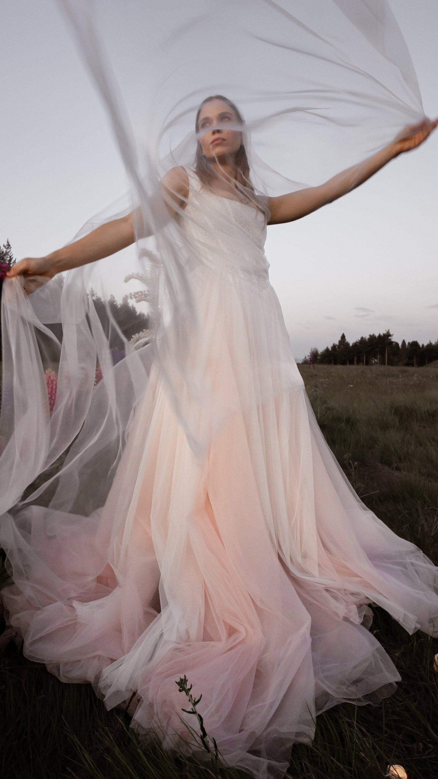 3-in-1 liquid super organza veil worn as a mantilla-style veil, neck scarf and editorial bridal veil with ultra-light finish
