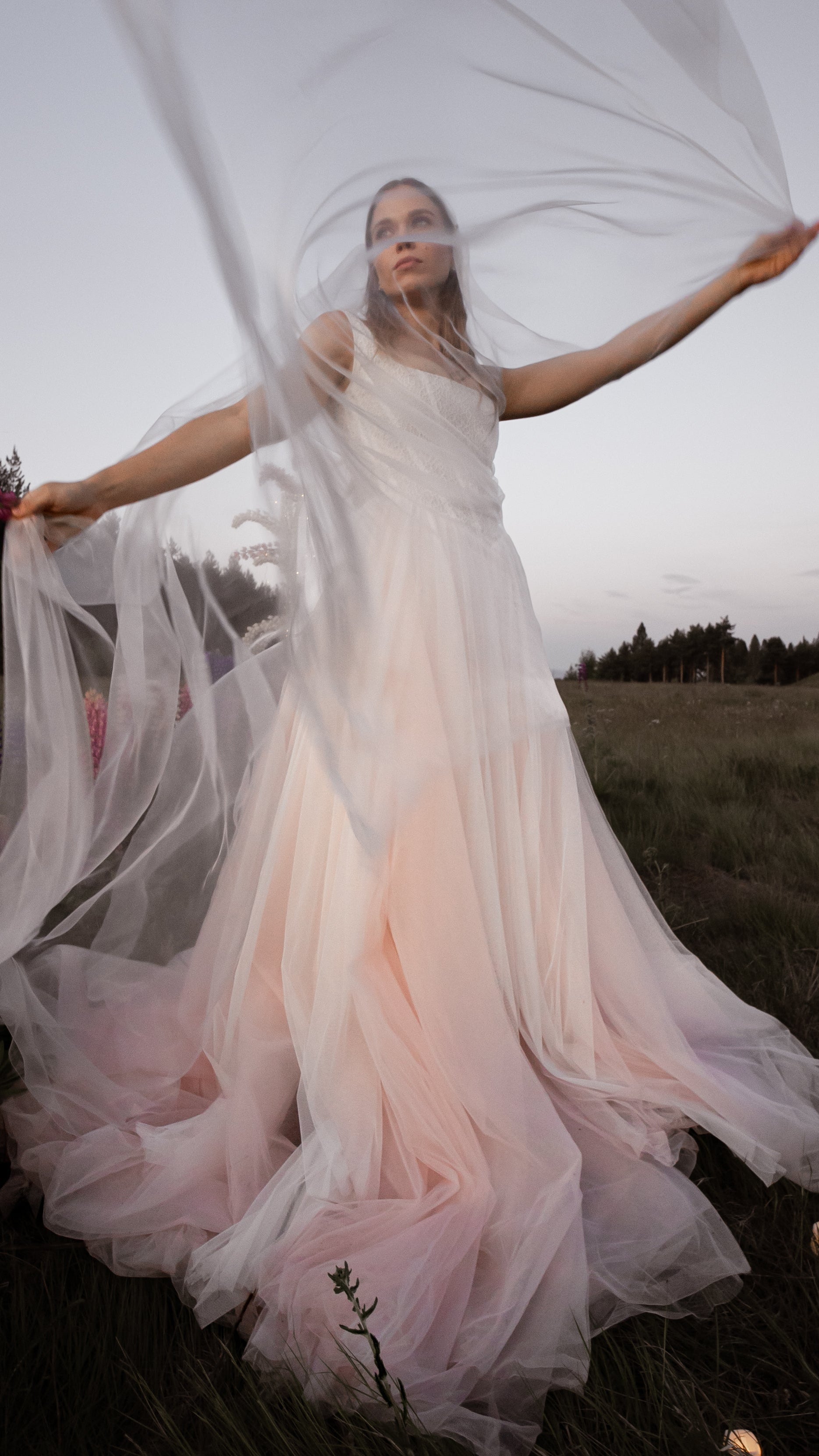 3-in-1 liquid super organza veil worn as a mantilla-style veil, neck scarf and editorial bridal veil with ultra-light finish