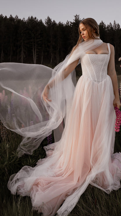 3-in-1 liquid super organza veil worn as a mantilla-style veil, neck scarf and editorial bridal veil with ultra-light finish