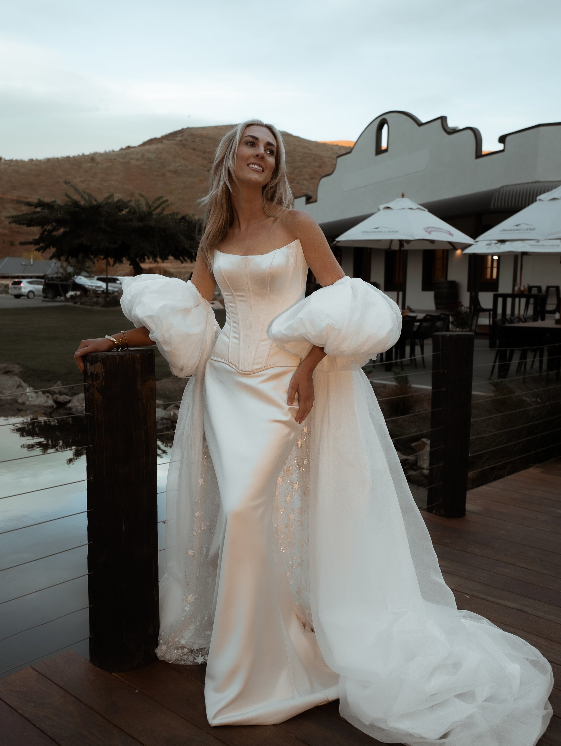 vogue editorial style wedding vintage inspired bridal cape with puff sleeves - 2025 2026 wedding dress trend, castle wedding, ceremony outfit by boom blush