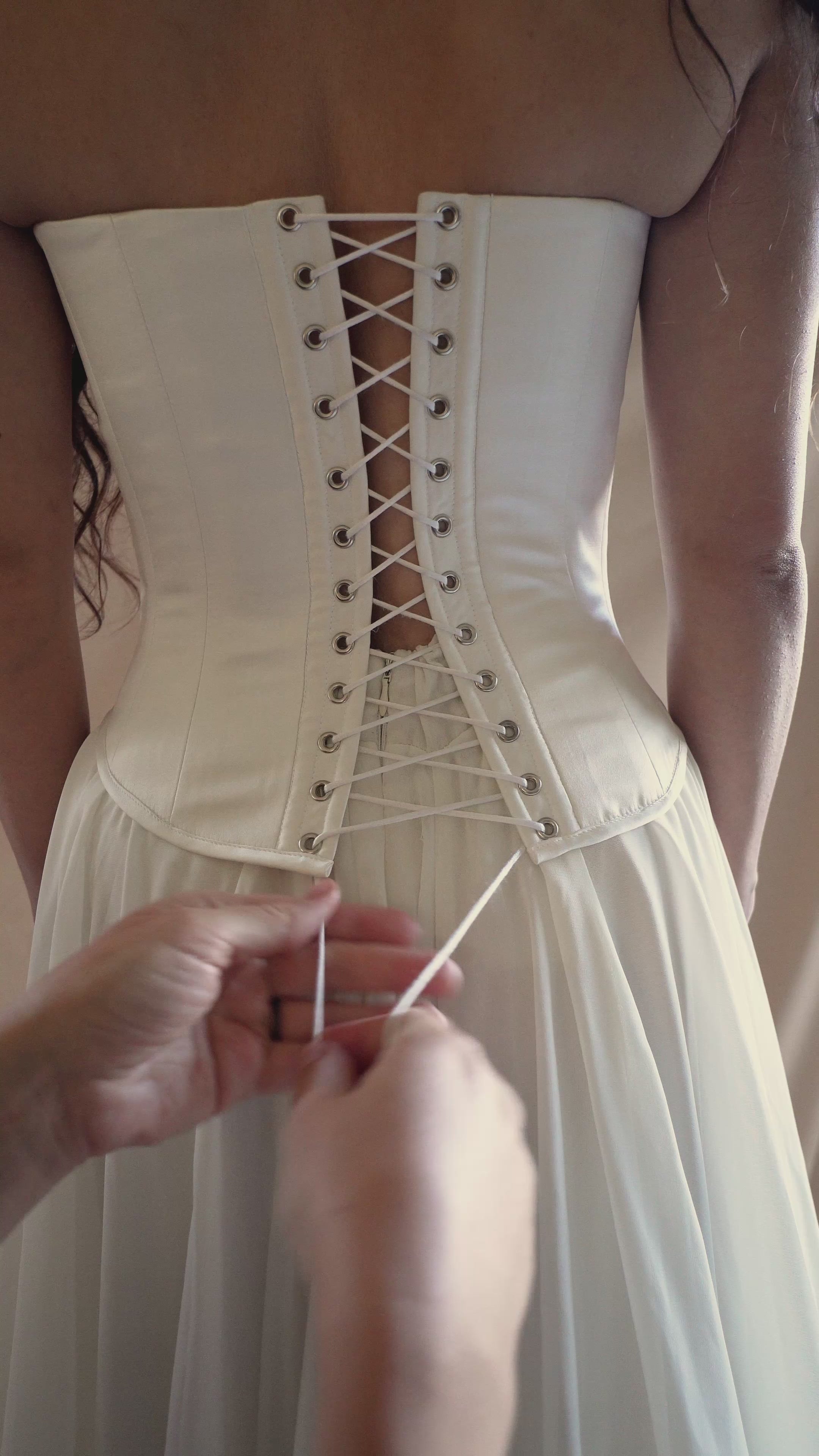 Venus bridal ensemble featuring ivory satin corset, A-line chiffon