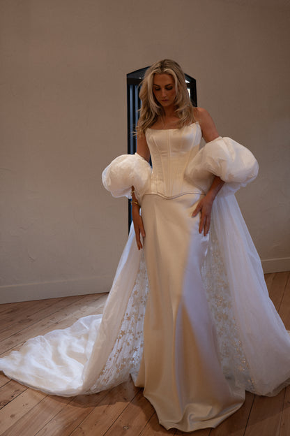 vogue editorial style wedding vintage inspired bridal cape with puff sleeves - 2025 2026 wedding dress trend, castle wedding, ceremony outfit by boom blush
