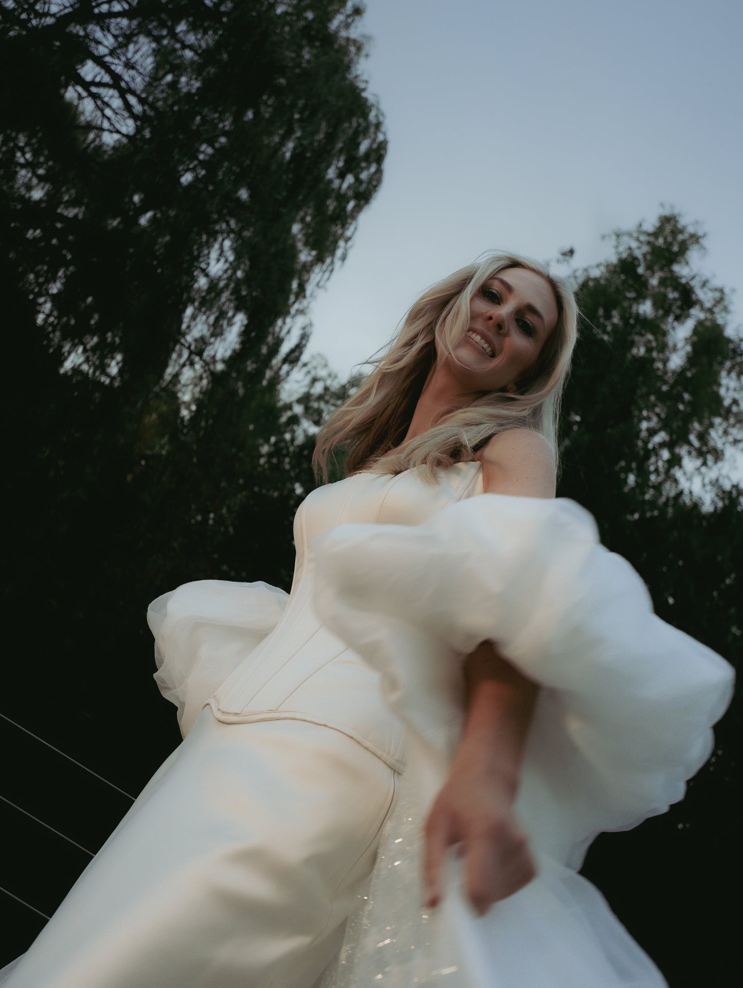 vogue editorial style wedding vintage inspired bridal cape with puff sleeves - 2025 2026 wedding dress trend, castle wedding, ceremony outfit by boom blush
