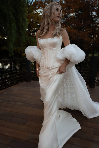 vogue editorial style wedding vintage inspired bridal cape with puff sleeves - 2025 2026 wedding dress trend, castle wedding, ceremony outfit by boom blush