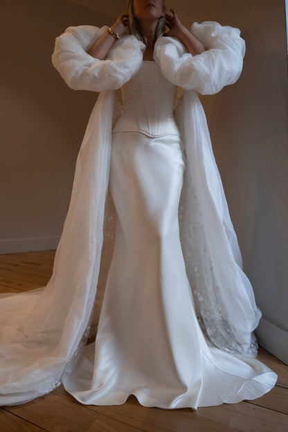 vogue editorial style wedding vintage inspired bridal cape with puff sleeves - 2025 2026 wedding dress trend, castle wedding, ceremony outfit by boom blush